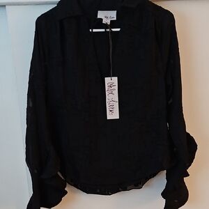 Relaxed Black Blouse with Notched Collar and Long Sleeves